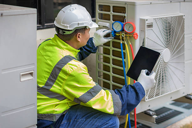 Professional Heat Pump Repair technician working in Newark, TX
